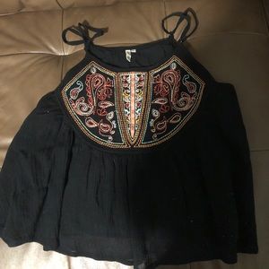 flowy black top with colorful pattern